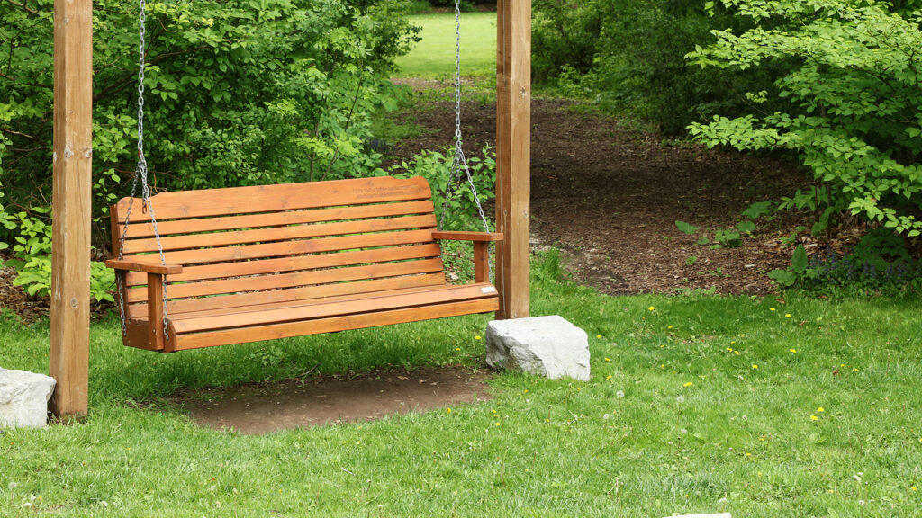 Swinging bench outdoors
